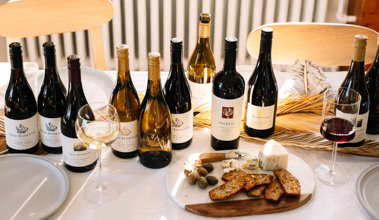 A table strewn with MacRostie bottles and food pairings.