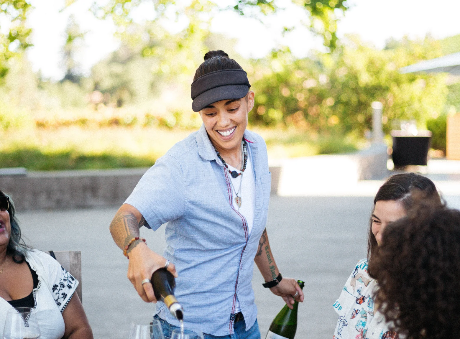 Wine ambassador serving guests at the MacRostie Estate House
