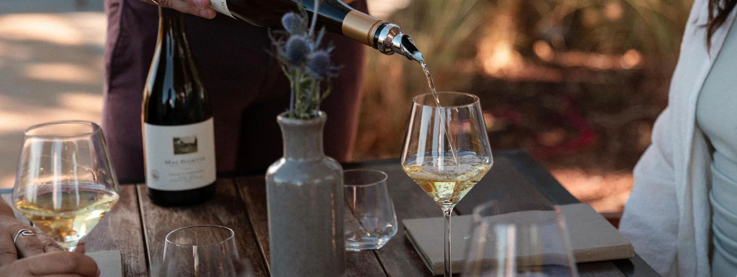 Wine being poured into a wine glass